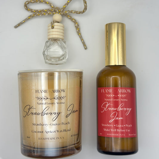 Two products from Flame Arrow: a candle and a bottle labeled 'Strawberry Jam' on a light background.
