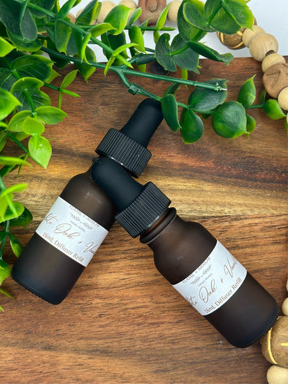 A sustainable dropper bottle of fragrance oil for a bamboo cork diffuser.