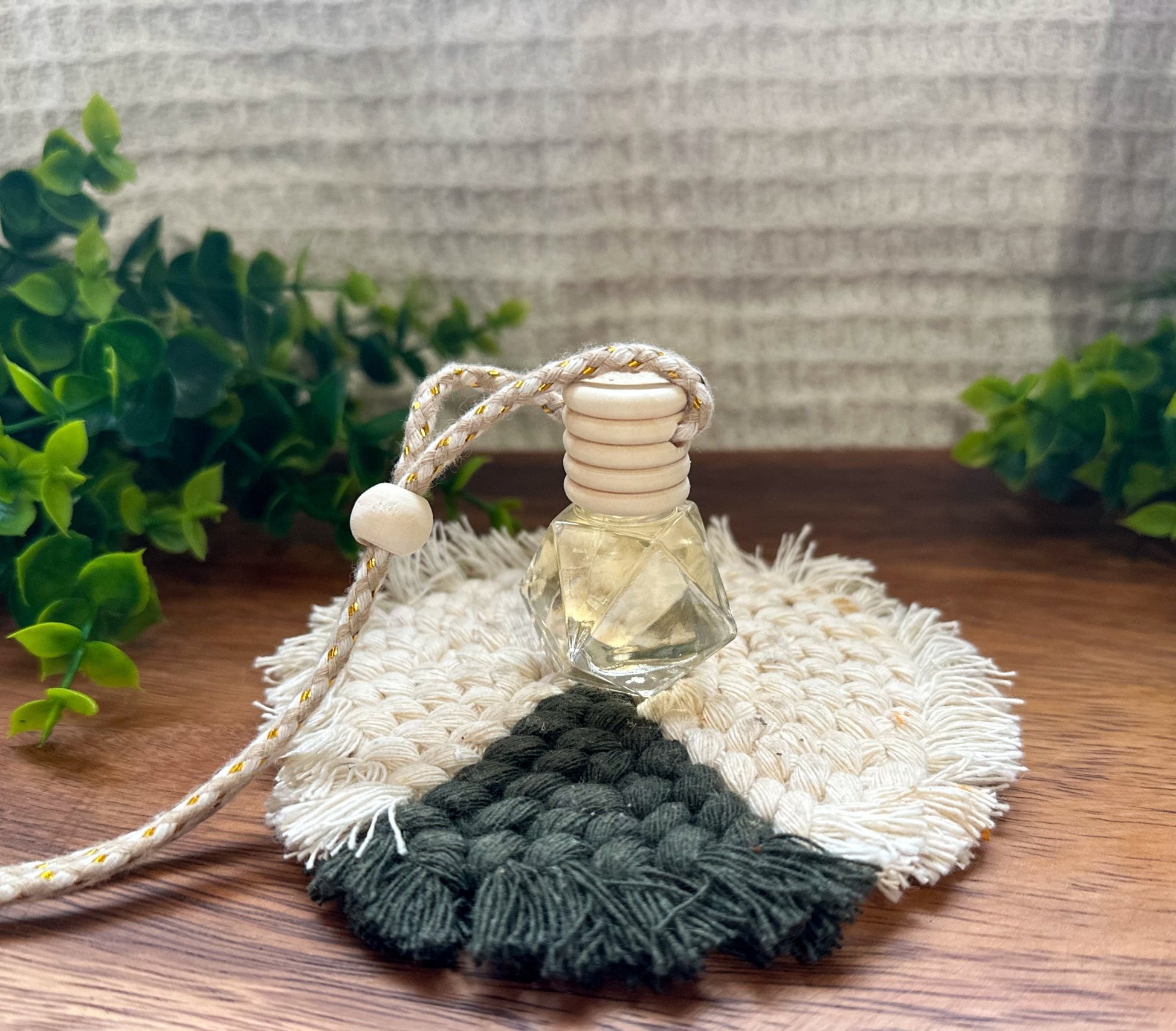 Car diffuser sitting on a tablescape.